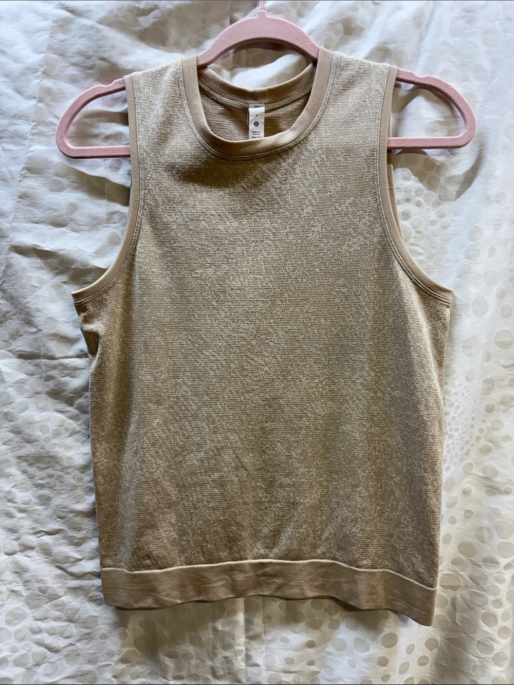 Lululemon Swiftly Breathe Muscle Tank in a metallic beige - size 4